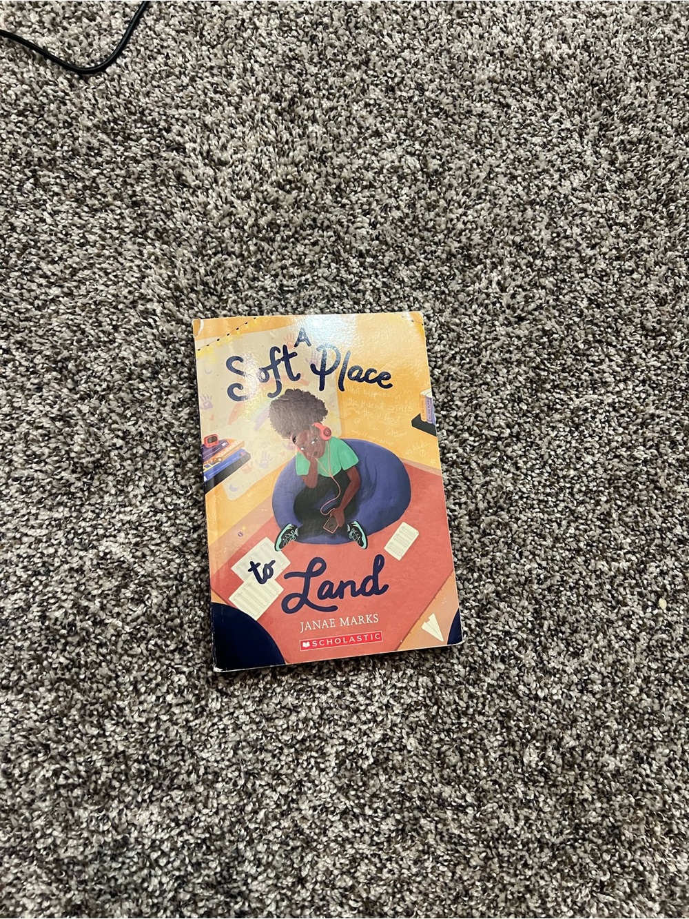 Scholastic 'A Soft Place to Land' — Yellow, Red & Blue Paperback